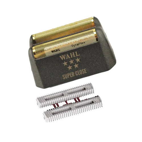 Wahl shaver head with gold and silver components on a white background